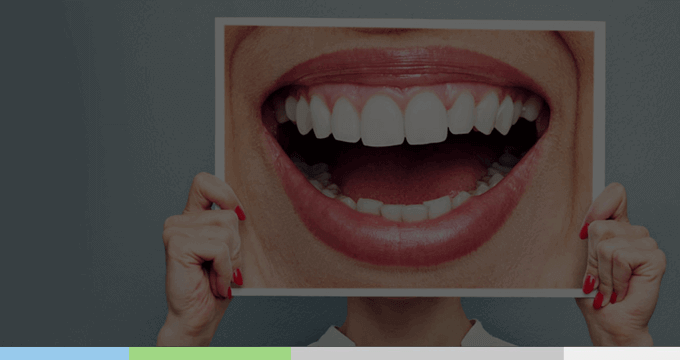 Happy patient showing beautiful smile after treatment